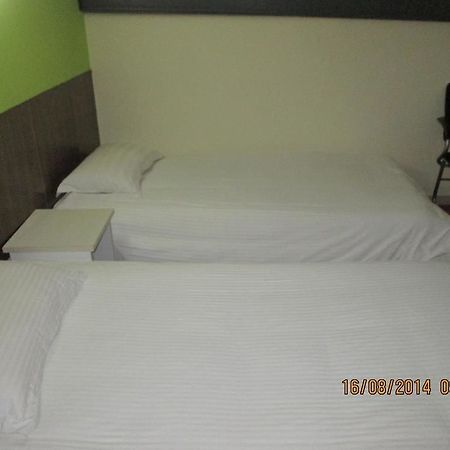 Tai'An Business Travel Hotel Bagian luar foto