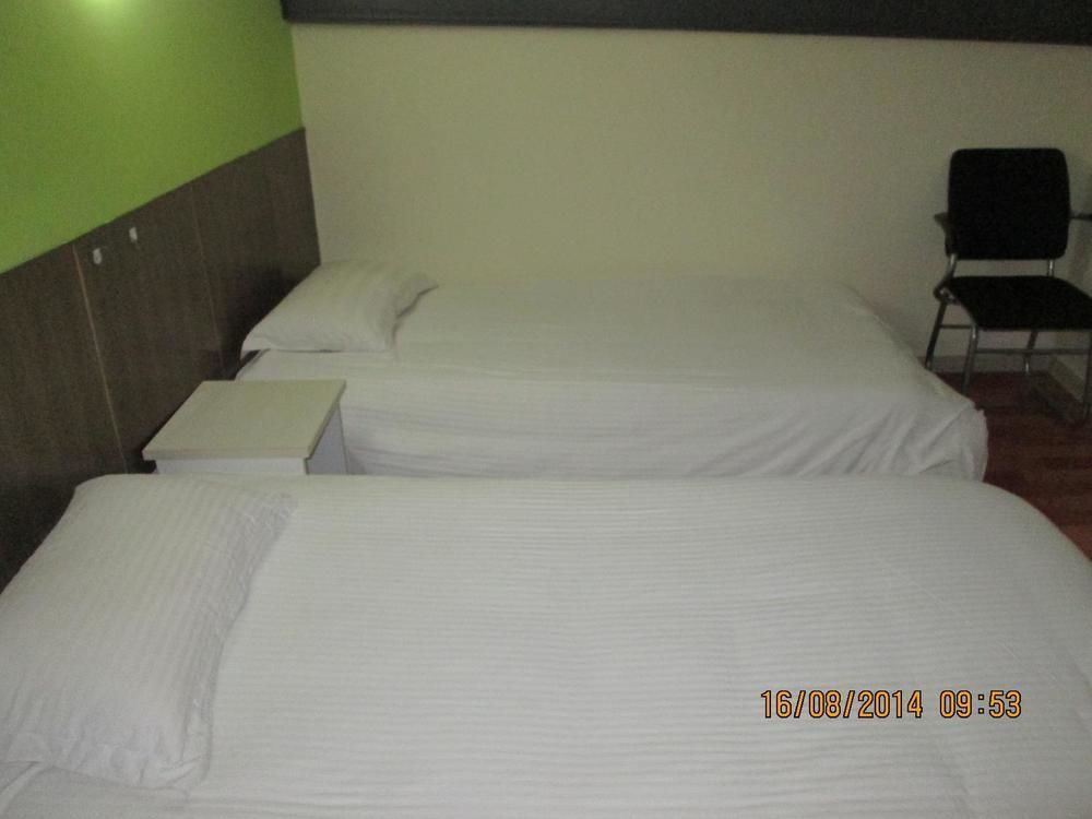 Tai'An Business Travel Hotel Bagian luar foto