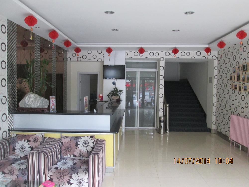 Tai'An Business Travel Hotel Bagian luar foto