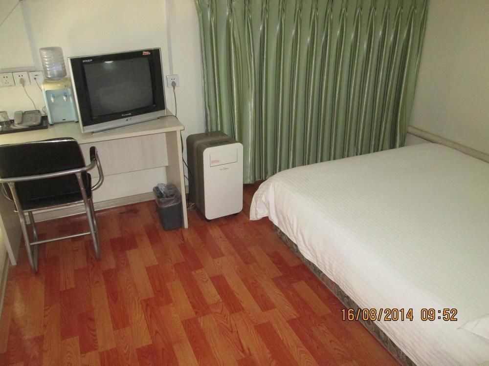 Tai'An Business Travel Hotel Bagian luar foto