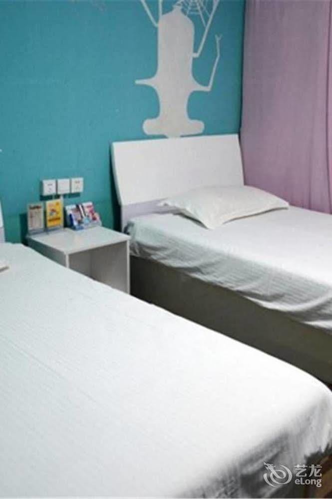 Tai'An Business Travel Hotel Bagian luar foto